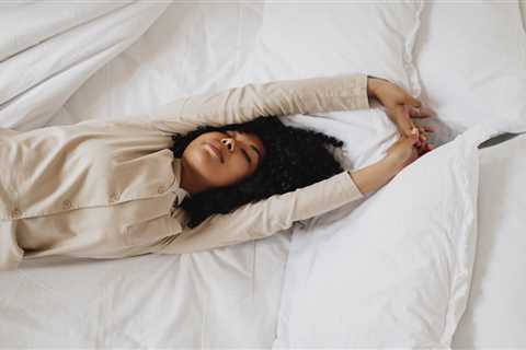 Can’t Sleep? Try These 6 Restorative Poses (In Bed)